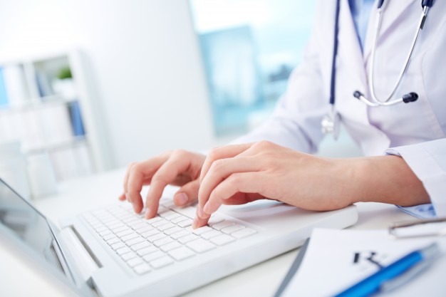 doctor-looking-information-database_1098-2572